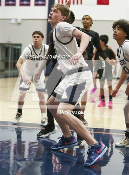 Thumbnail 3 in Lake Ridge vs. Wylie East (Denton Ryan Holiday Showcase) photogallery.