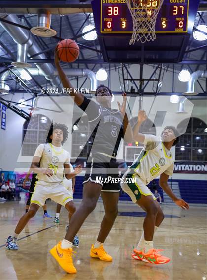 Thumbnail 3 in Riviera Prep vs Roselle Catholic (Miami Holiday Invitational) photogallery.