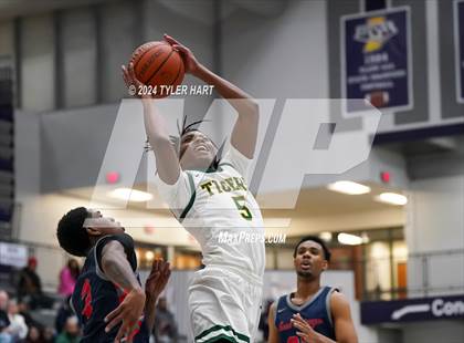 Thumbnail 2 in Indianapolis Crispus Attucks vs. East Chicago Central (Sneakers for Santa Shootout) photogallery.