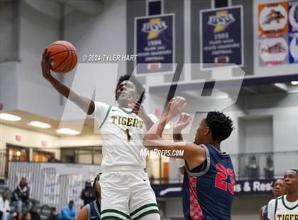 Thumbnail 1 in Indianapolis Crispus Attucks vs. East Chicago Central (Sneakers for Santa Shootout) photogallery.