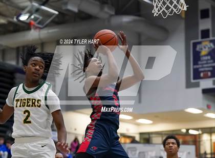 Thumbnail 1 in Indianapolis Crispus Attucks vs. East Chicago Central (Sneakers for Santa Shootout) photogallery.