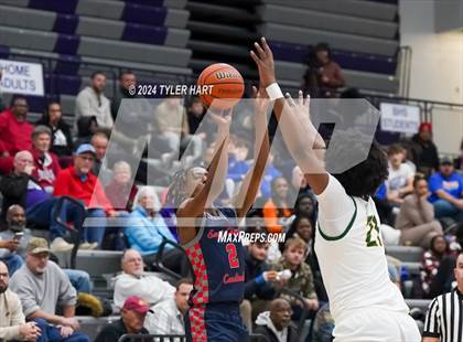 Thumbnail 1 in Indianapolis Crispus Attucks vs. East Chicago Central (Sneakers for Santa Shootout) photogallery.