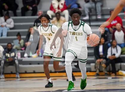 Thumbnail 1 in Indianapolis Crispus Attucks vs. East Chicago Central (Sneakers for Santa Shootout) photogallery.