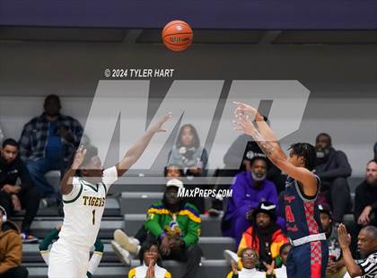 Thumbnail 2 in Indianapolis Crispus Attucks vs. East Chicago Central (Sneakers for Santa Shootout) photogallery.