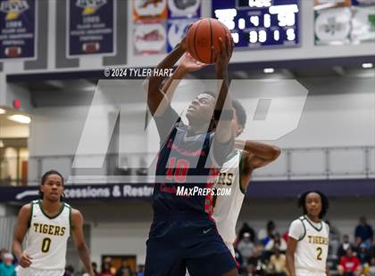 Thumbnail 1 in Indianapolis Crispus Attucks vs. East Chicago Central (Sneakers for Santa Shootout) photogallery.