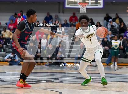 Thumbnail 1 in Indianapolis Crispus Attucks vs. East Chicago Central (Sneakers for Santa Shootout) photogallery.