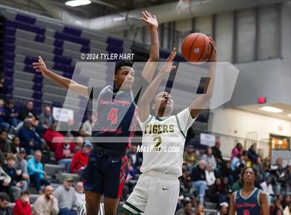 Thumbnail 2 in Indianapolis Crispus Attucks vs. East Chicago Central (Sneakers for Santa Shootout) photogallery.