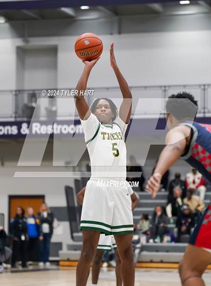 Thumbnail 1 in Indianapolis Crispus Attucks vs. East Chicago Central (Sneakers for Santa Shootout) photogallery.