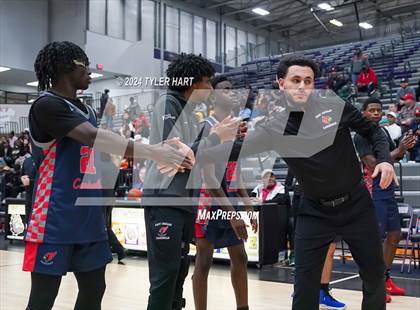 Thumbnail 1 in Indianapolis Crispus Attucks vs. East Chicago Central (Sneakers for Santa Shootout) photogallery.