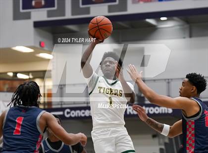 Thumbnail 1 in Indianapolis Crispus Attucks vs. East Chicago Central (Sneakers for Santa Shootout) photogallery.