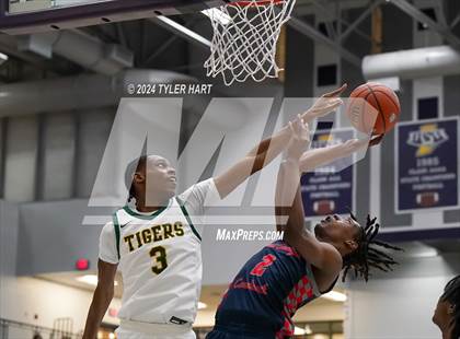 Thumbnail 3 in Indianapolis Crispus Attucks vs. East Chicago Central (Sneakers for Santa Shootout) photogallery.
