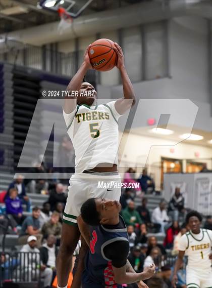 Thumbnail 1 in Indianapolis Crispus Attucks vs. East Chicago Central (Sneakers for Santa Shootout) photogallery.