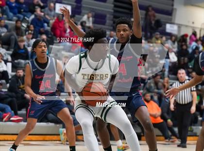 Thumbnail 1 in Indianapolis Crispus Attucks vs. East Chicago Central (Sneakers for Santa Shootout) photogallery.