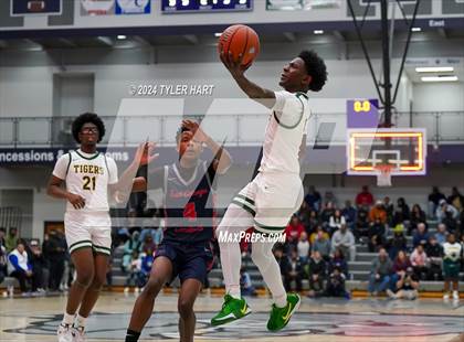 Thumbnail 2 in Indianapolis Crispus Attucks vs. East Chicago Central (Sneakers for Santa Shootout) photogallery.