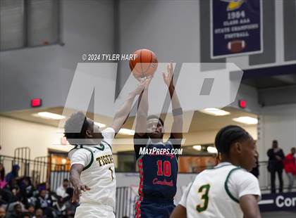 Thumbnail 3 in Indianapolis Crispus Attucks vs. East Chicago Central (Sneakers for Santa Shootout) photogallery.