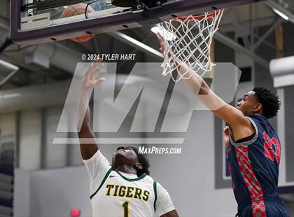 Thumbnail 1 in Indianapolis Crispus Attucks vs. East Chicago Central (Sneakers for Santa Shootout) photogallery.