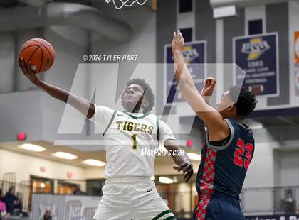 Thumbnail 2 in Indianapolis Crispus Attucks vs. East Chicago Central (Sneakers for Santa Shootout) photogallery.