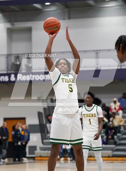Thumbnail 1 in Indianapolis Crispus Attucks vs. East Chicago Central (Sneakers for Santa Shootout) photogallery.