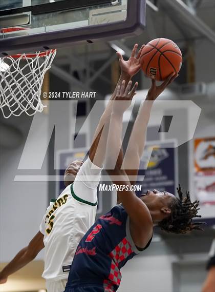 Thumbnail 1 in Indianapolis Crispus Attucks vs. East Chicago Central (Sneakers for Santa Shootout) photogallery.