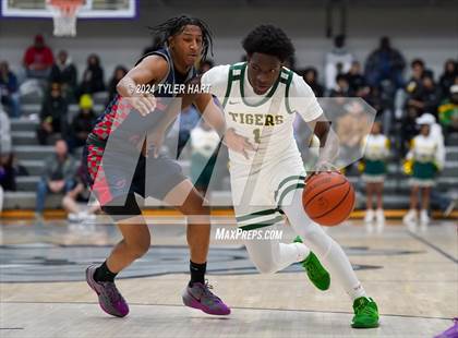 Thumbnail 2 in Indianapolis Crispus Attucks vs. East Chicago Central (Sneakers for Santa Shootout) photogallery.