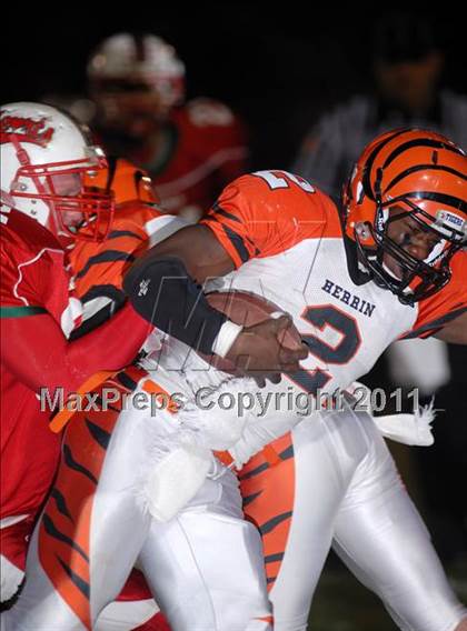 Thumbnail 1 in Herrin @ Effingham (IHSA Class 4A Playoffs - First Round) photogallery.