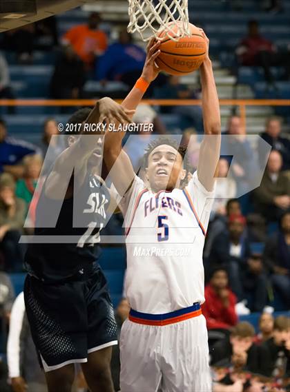 Thumbnail 1 in East St. Louis vs. St. Louis University photogallery.