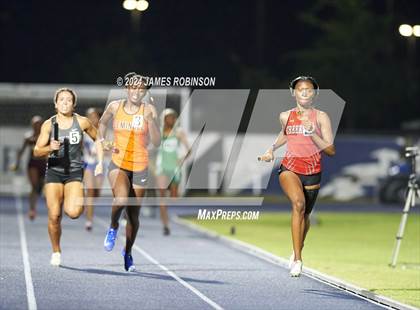 Thumbnail 2 in FHSAA 4A Region 1 (4 x 400 Meter) photogallery.