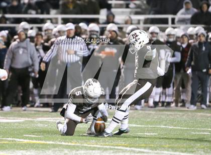 Thumbnail 1 in East St. Louis @ Mt. Carmel (IHSA Class 7A Quarterfinal) photogallery.