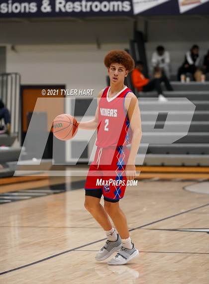 Thumbnail 3 in Indianapolis Crispus Attucks vs. Linton-Stockton (Sneakers for Santa Shootout) photogallery.