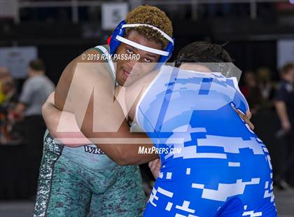 Thumbnail 1 in NYSPHSAA D1 Wrestling Championships (Semifinals - 182- 285 lbs) photogallery.