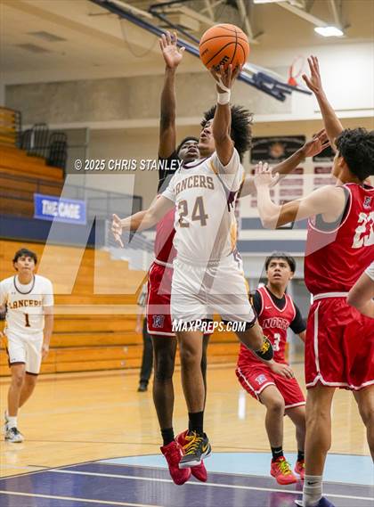 Thumbnail 3 in Salpointe Catholic vs North (PXU Coyote Classic) photogallery.
