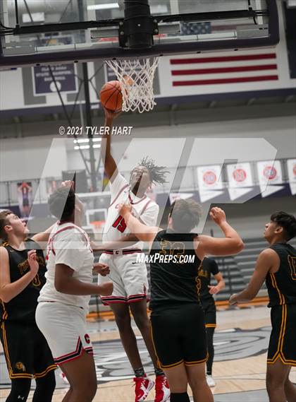 Thumbnail 1 in Tuscola vs. 21st Century Charter (Sneakers for Santa Shootout) photogallery.