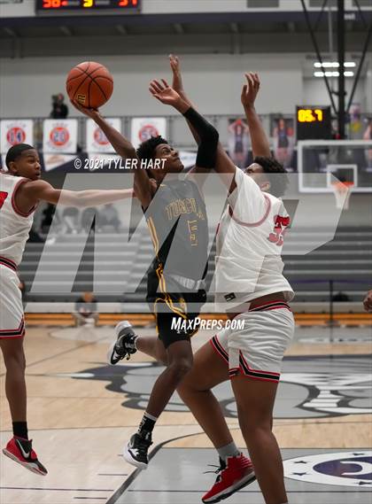 Thumbnail 2 in Tuscola vs. 21st Century Charter (Sneakers for Santa Shootout) photogallery.