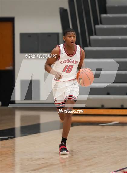 Thumbnail 1 in Tuscola vs. 21st Century Charter (Sneakers for Santa Shootout) photogallery.
