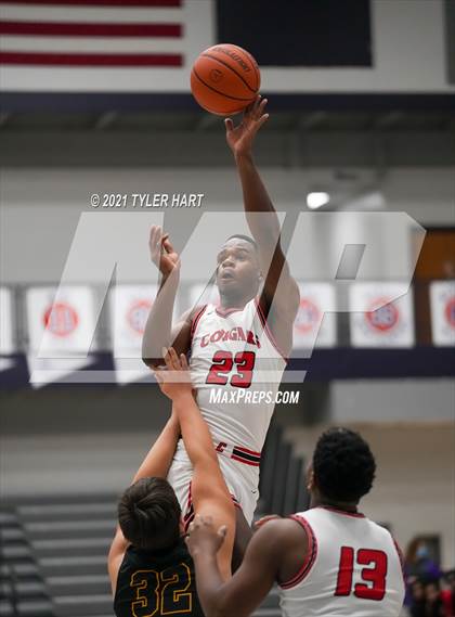 Thumbnail 1 in Tuscola vs. 21st Century Charter (Sneakers for Santa Shootout) photogallery.