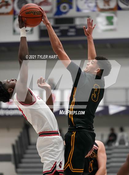 Thumbnail 1 in Tuscola vs. 21st Century Charter (Sneakers for Santa Shootout) photogallery.