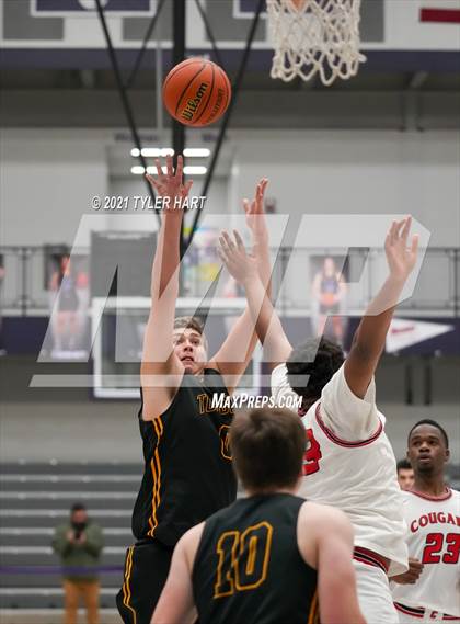Thumbnail 1 in Tuscola vs. 21st Century Charter (Sneakers for Santa Shootout) photogallery.