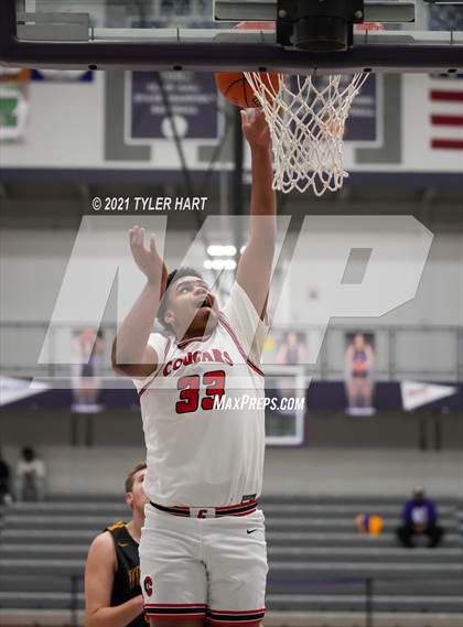 Thumbnail 1 in Tuscola vs. 21st Century Charter (Sneakers for Santa Shootout) photogallery.