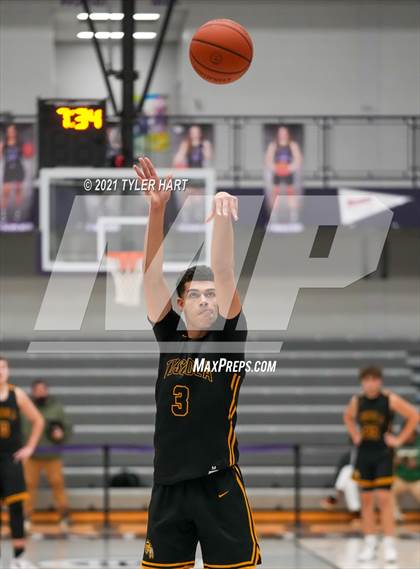 Thumbnail 1 in Tuscola vs. 21st Century Charter (Sneakers for Santa Shootout) photogallery.