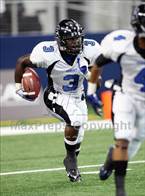 Summit's Lewis Washington follows blockers.
