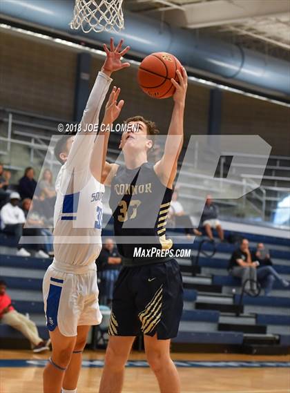 Thumbnail 3 in O'Connor vs  South San Antonio (South San Boys Basketball Tournament) photogallery.