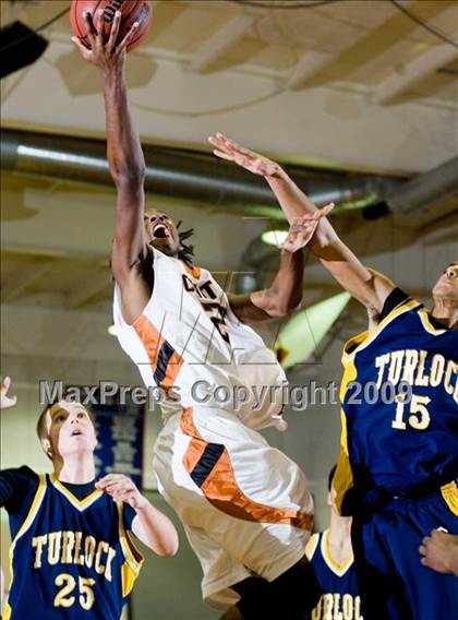 Thumbnail 1 in Turlock vs. Central (Modesto Christian Holiday Hoops)  photogallery.