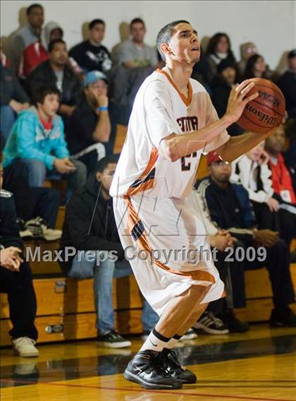 Thumbnail 1 in Turlock vs. Central (Modesto Christian Holiday Hoops)  photogallery.