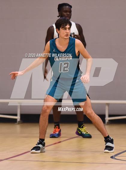 Thumbnail 3 in Evans vs. Olympia (Metro Hoop Fest) photogallery.