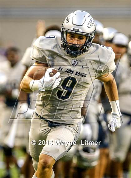Thumbnail 3 in St. John Bosco vs St. X (Crosstown Showdown) photogallery.