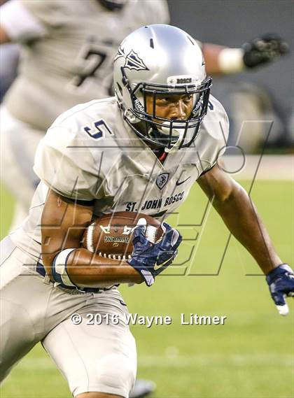 Thumbnail 1 in St. John Bosco vs St. X (Crosstown Showdown) photogallery.