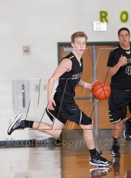 Thumbnail 2 in John Paul II vs The Colony (Carrollton-Farmers Branch Basketball Classic) photogallery.