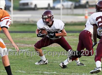 Thumbnail 1 in Austin Freshman Maroon @ Round Rock Westwood Freshman Orange photogallery.