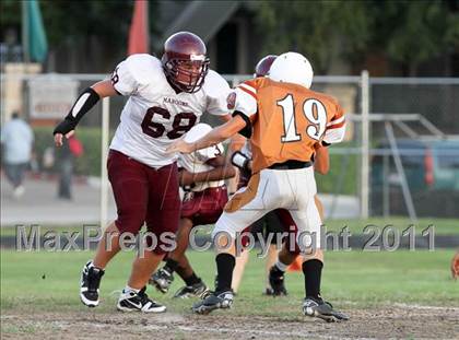 Thumbnail 2 in Austin Freshman Maroon @ Round Rock Westwood Freshman Orange photogallery.