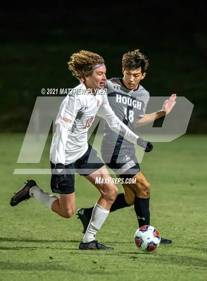 Thumbnail 2 in New Hanover vs. Hough (NCHSAA 4A Final) photogallery.